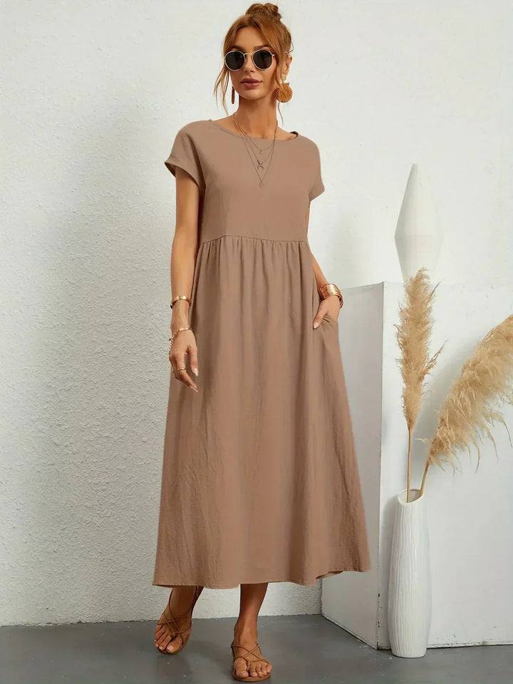 Gabrielle™ — Elegancka, midi sukienka o swobodnym kroju