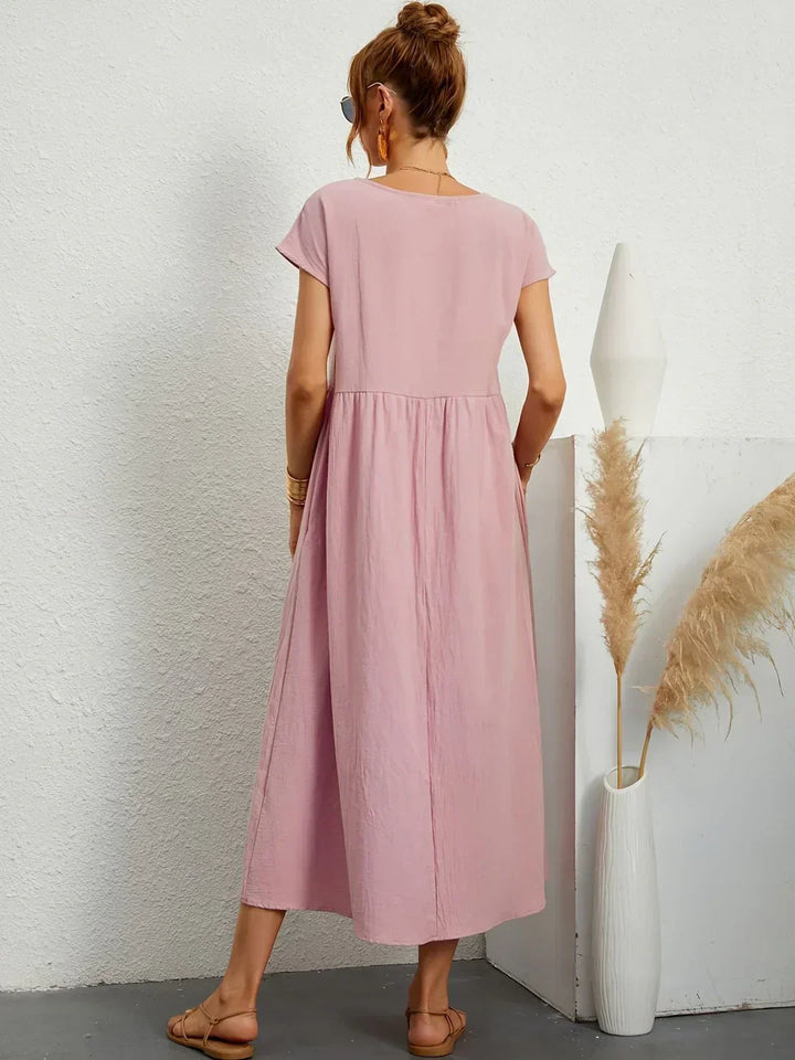 Gabrielle™ — Elegancka, midi sukienka o swobodnym kroju