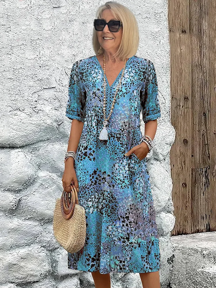 ZUZANNA | ŻYWE MIDI SUKIENKA Z ELEGANCKIM ZASŁONIENIEM BRZUSZKA